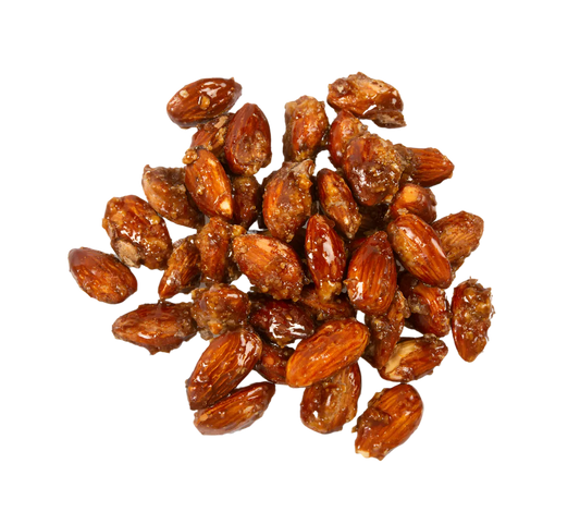 Amandes sucrées PROFRUIT caramélisées disposées en tas, texture croquante et goût doux, idéales pour une pause sucrée naturelle.