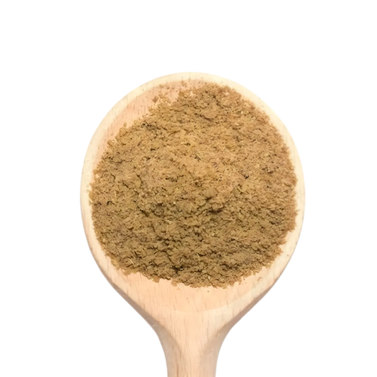 Anis vert moulu SAMIA présenté sur une cuillère en bois, épice fine pour cuisine sucrée ou salée, saveur douce et parfumée.