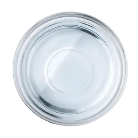 Vue du dessus d'un récipient contenant l'arôme fleur d'oranger SAMIA, ingrédient essentiel pour pâtisseries orientales et boissons.