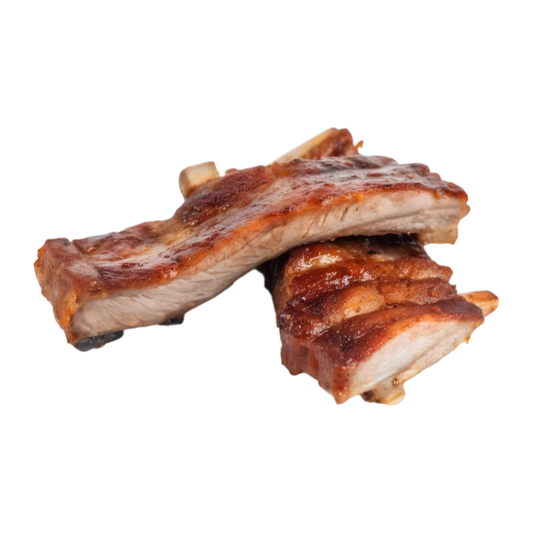 Côtis de porc fumé cuits, morceaux juteux et dorés, parfaits pour savourer une viande tendre au goût fumé authentique.