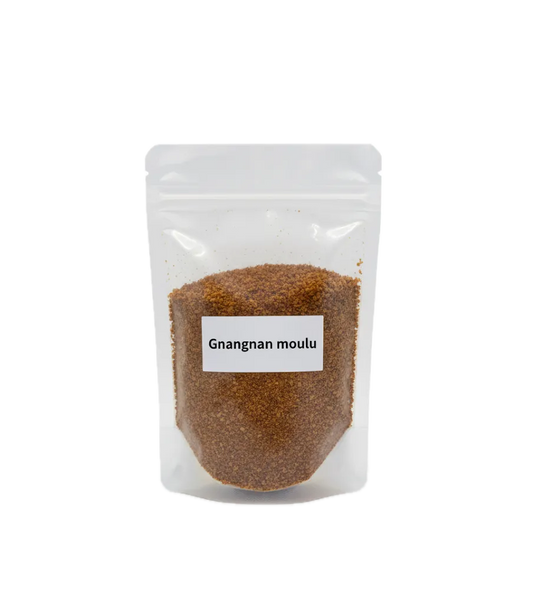 Gnangnan Moulu - Condiment Traditionnel en sachet refermable, parfait pour rehausser viandes, poissons et sauces. Épicerie salée authentique.
