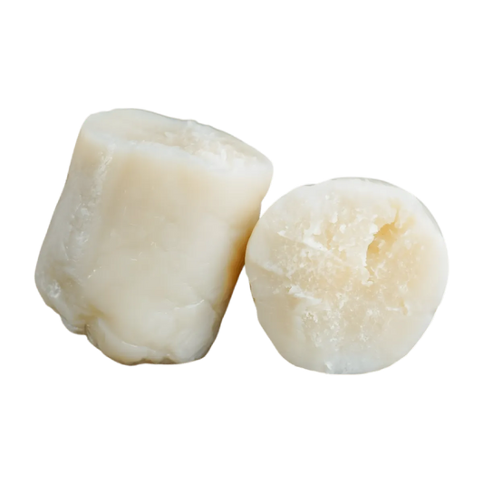 Pâte de manioc Kwanga NUMBER ONE coupée, texture ferme et moelleuse, parfaite pour accompagner vos plats salés exotiques.