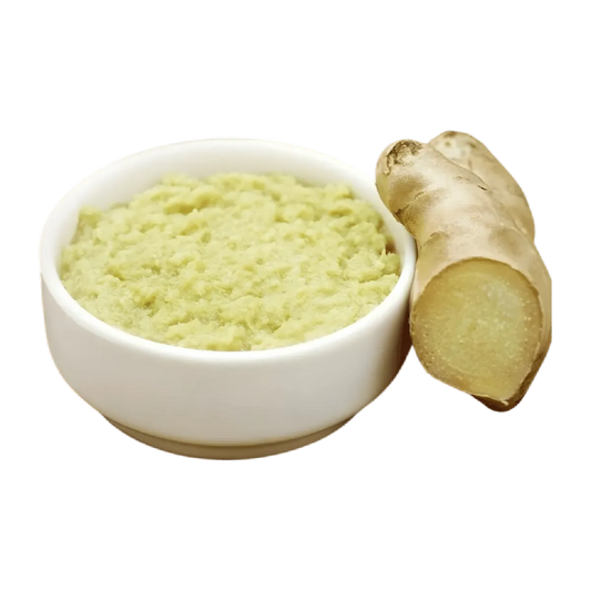 Bol de pâte de gingembre et ail SHAMA avec racine de gingembre fraîche, parfait pour assaisonner sauces et plats cuisinés. Texture lisse et piquante.