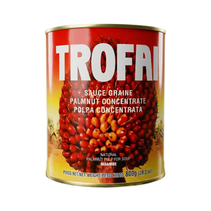 Sauce graine de palme concentrée, de Trofai, dans une boîte métallique rouge et jaune.