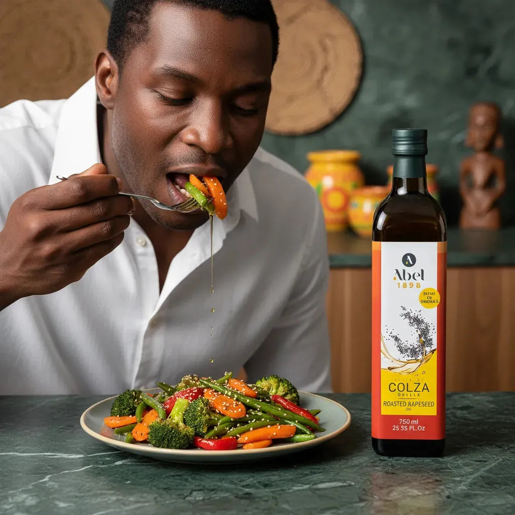 Homme dégustant un plat de légumes sautés préparé avec l'huile de colza ABEL, idéale pour une cuisine légère et savoureuse au quotidien.