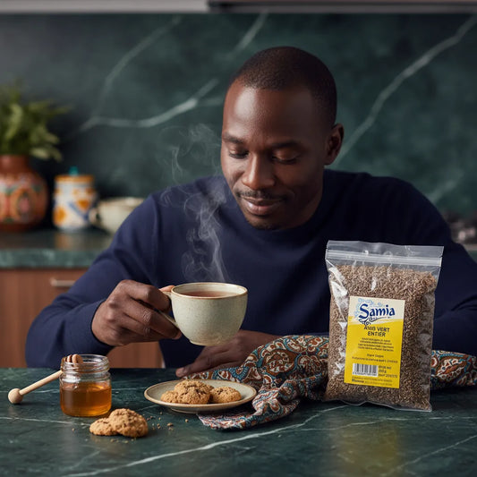 Homme dégustant une infusion préparée avec l'anis vert entier SAMIA, parfait pour rehausser boissons chaudes et biscuits maison.