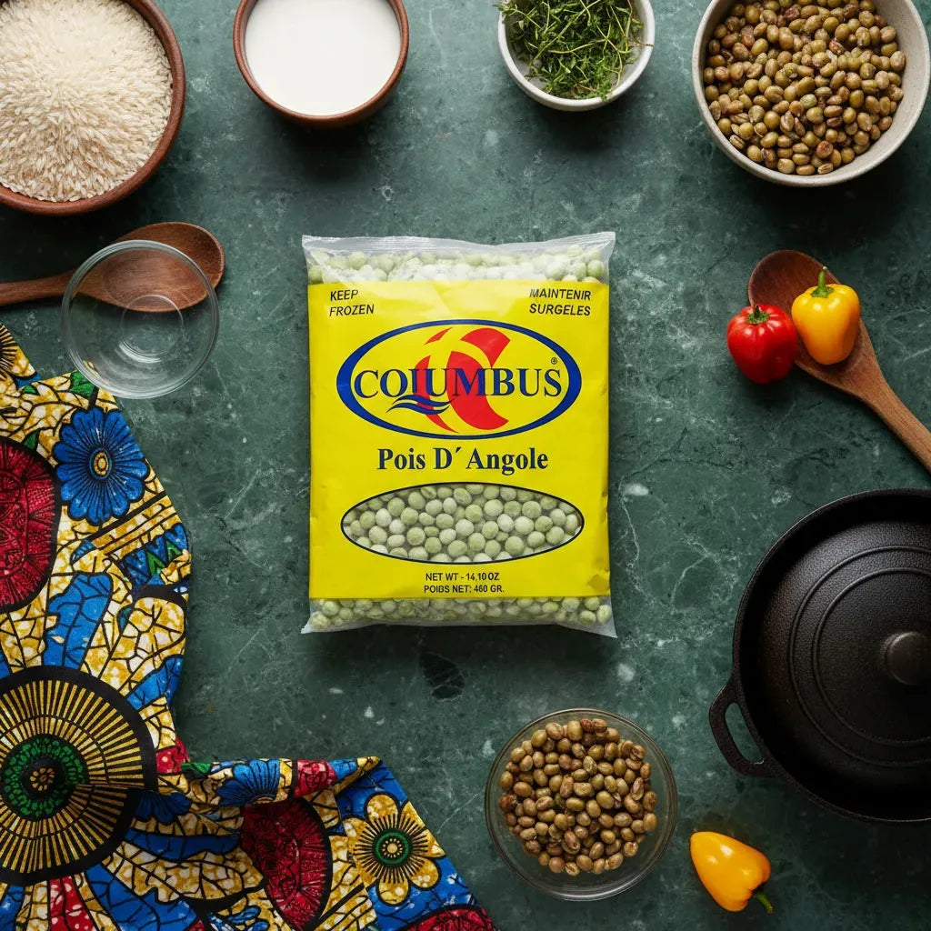 Sachet de Pois d'Angole COLUMBUS entouré d'ingrédients frais sur plan de travail, idéal pour cuisine créole et recettes traditionnelles.