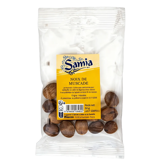 Noix de muscade SAMIA d'Indonésie en sachet transparent de 50g, épices entières idéales pour la cuisine traditionnelle et exotique.