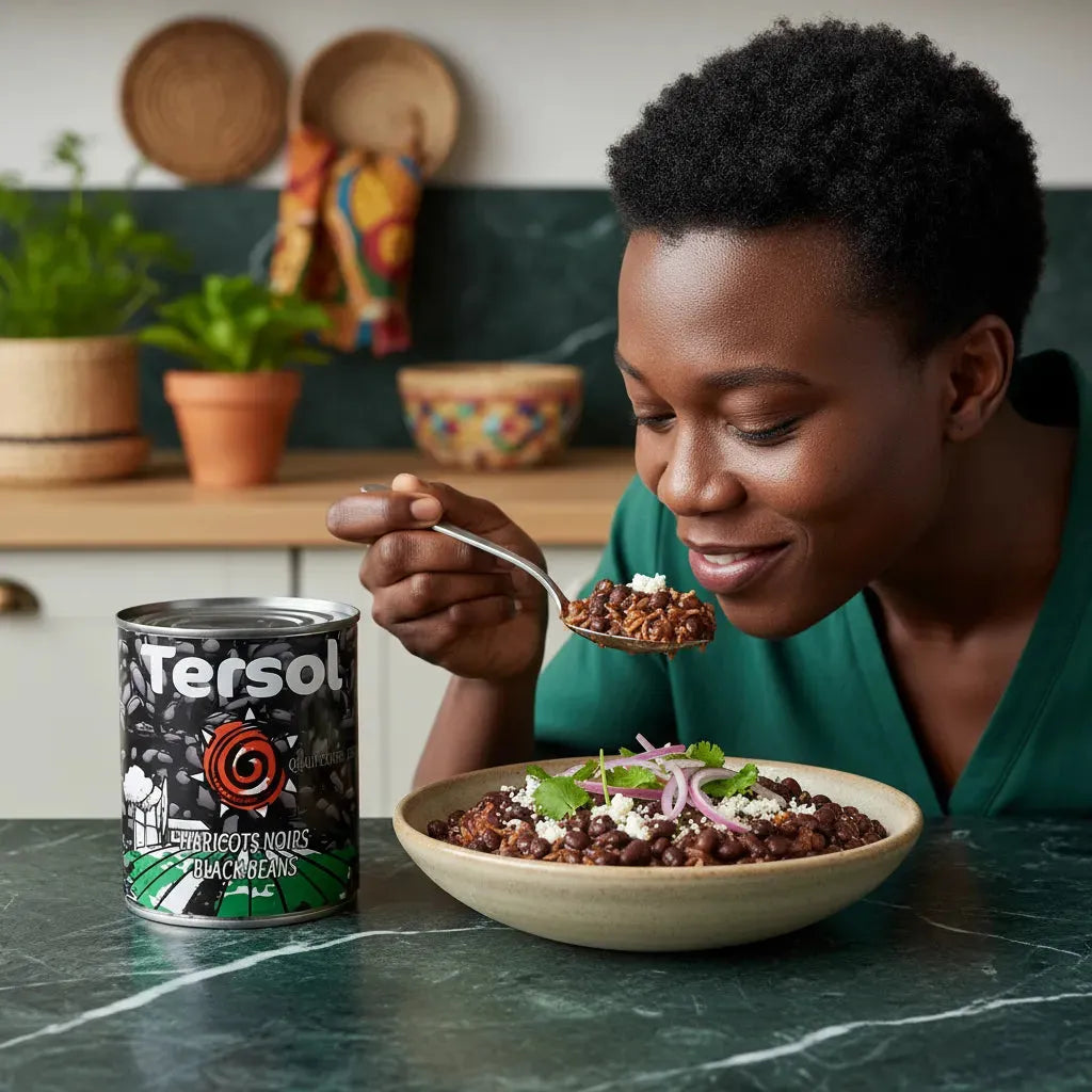 Femme dégustant un plat cuisiné aux haricots noirs TERSOL, riches en protéines et fibres, pour une alimentation saine et gourmande.