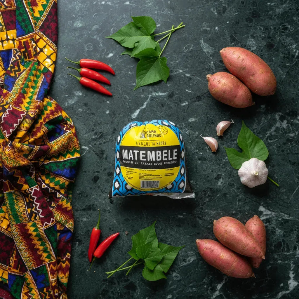 Feuille de Patate - Matembele surgelées posées sur table avec patates douces, piments et ail, parfaites pour plats traditionnels africains.