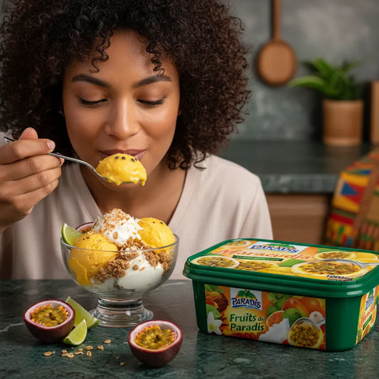 Femme dégustant une glace Paradis Maracudja servie avec yaourt et granola, pot de sorbet passion visible, ambiance gourmande et exotique.