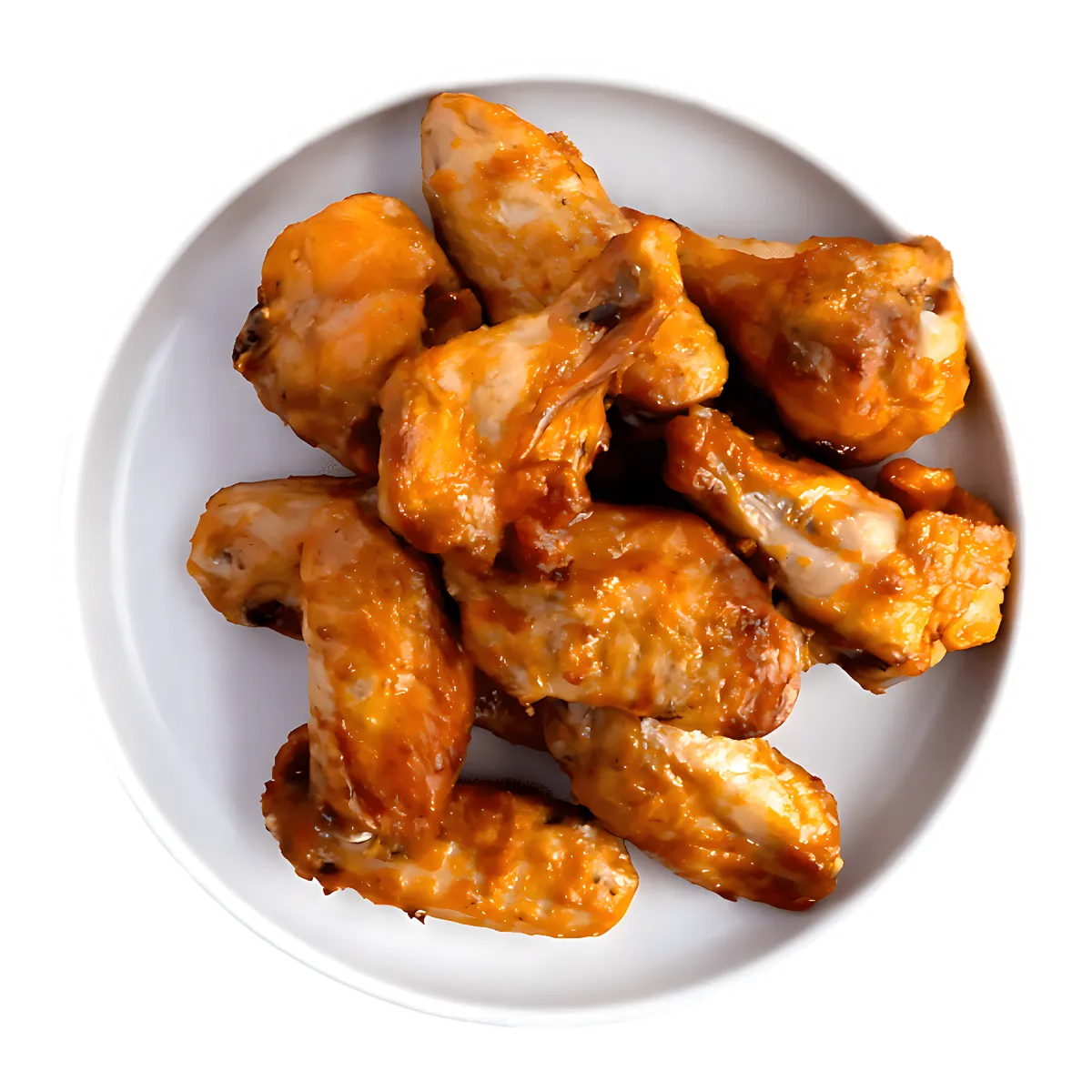 Assiette de plusieurs ailes de poulet Tex Mex fumées, prêtes à servir, parfaites pour un repas convivial ou un apéritif gourmand.