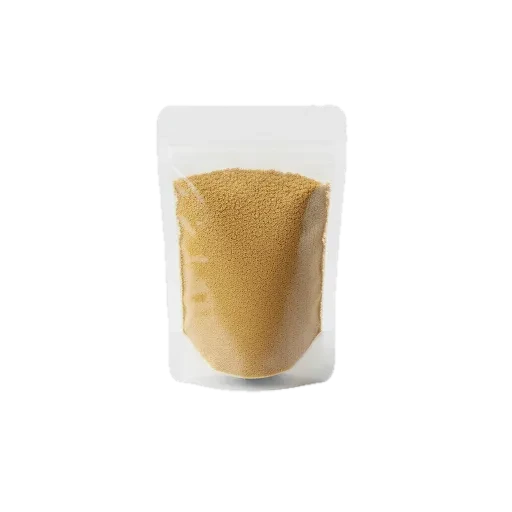 Sachet transparent d’Akpi moulue à texture fine, épice ouest-africaine utilisée en cuisine camerounaise pour relever les plats.