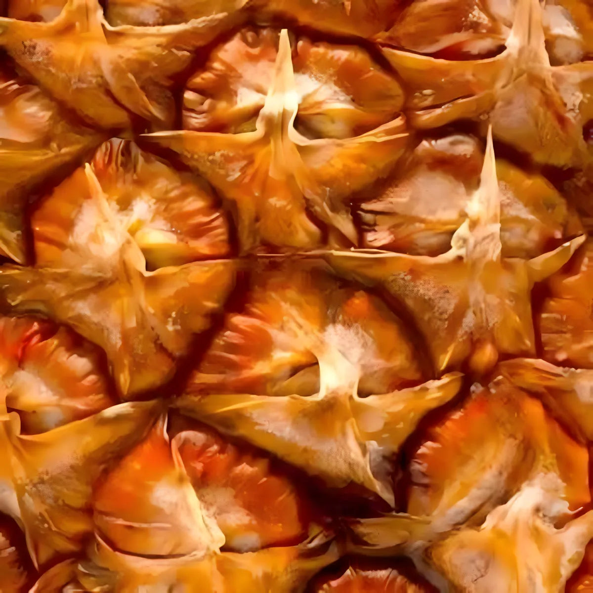 Gros plan sur la peau texturée de l’ananas Extra Sweet, illustrant sa maturité et sa qualité premium pour une fraîcheur optimale.