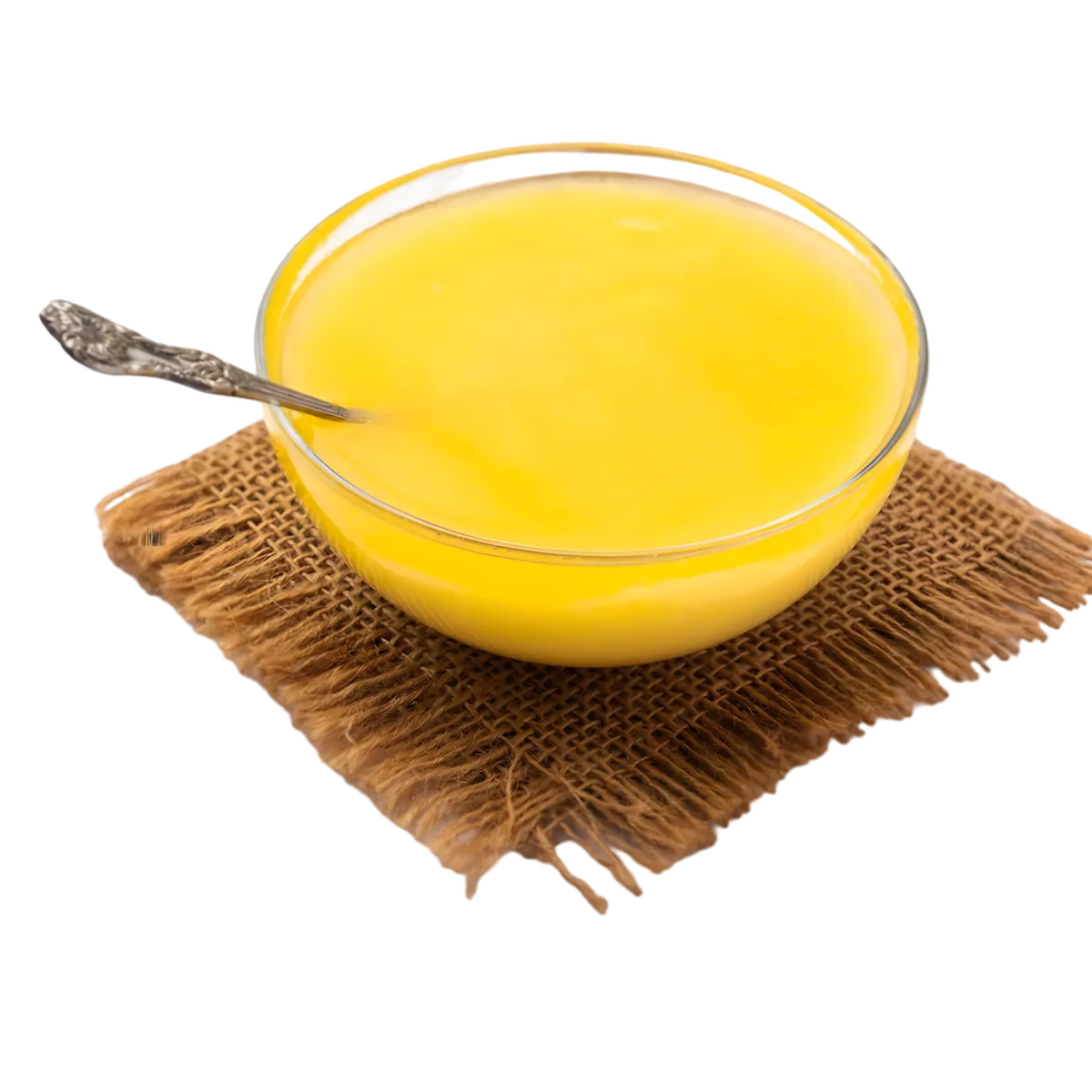Ghee KHANUM beurre clarifié doré dans un bol en verre sur toile de jute, texture onctueuse parfaite pour recettes salées et fritures.