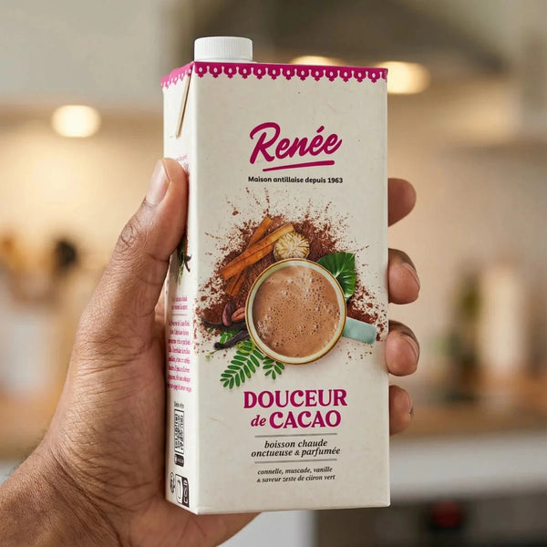 Hand holding a 1L carton of RENÉE cocoa drink. Delicious visual: cocoa, cinnamon, vanilla.