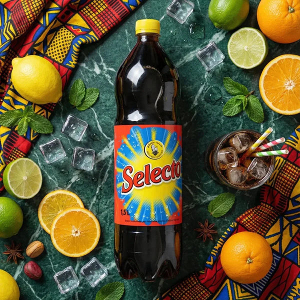 Bottle of Selecto 1.5L on a marbled green background with fresh citrus, mint, and ice cubes.