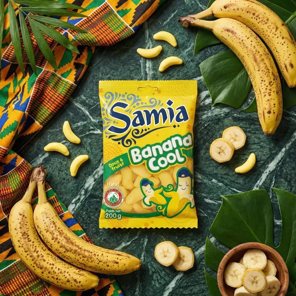 Bustina gialla caramelle alla banana "Samia Banana Cool" 200g, frutta fresca, foglie verdi.