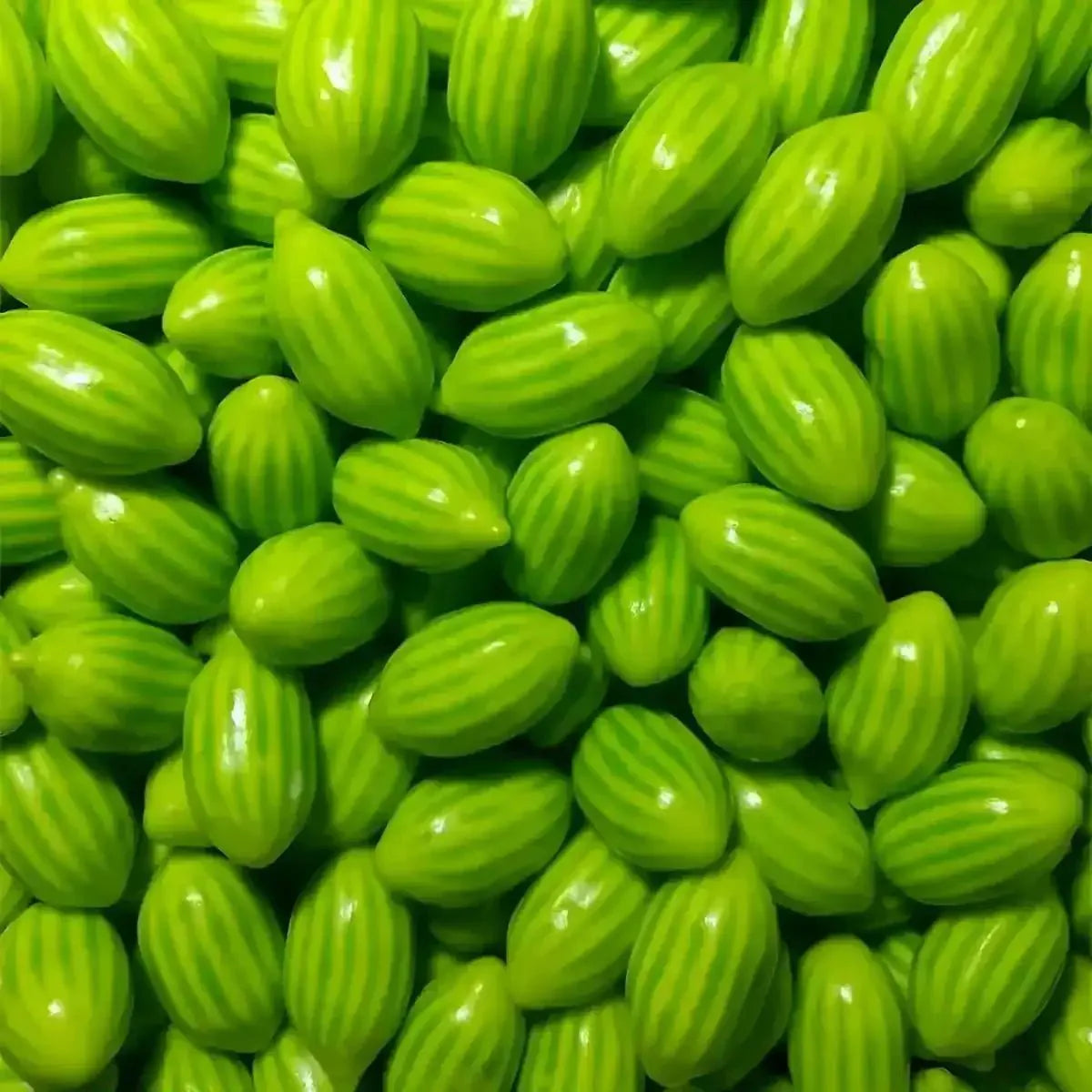 Halal SAMIA bubble melon candies, bright green color, subtle stripes, smooth texture.