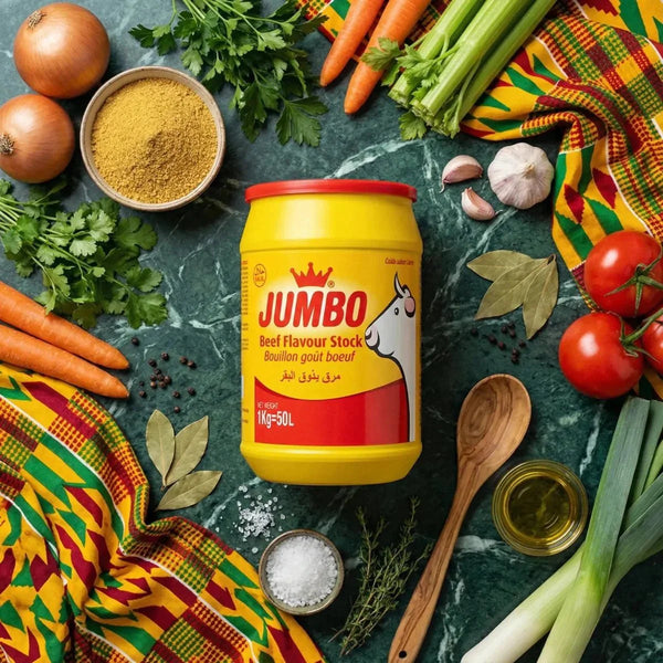 Bouillon de bœuf JUMBO en poudre, boîte jaune et rouge. Ingrédients frais autour : légumes.