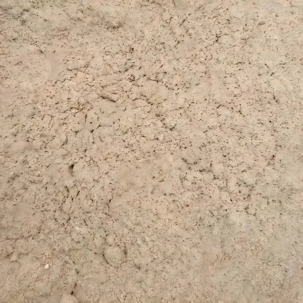 Texture de sol sec et argileux, non liée au produit Bouillon poudre boeuf JUMBO, hors contexte de l'épicerie salée ou des bouillons.