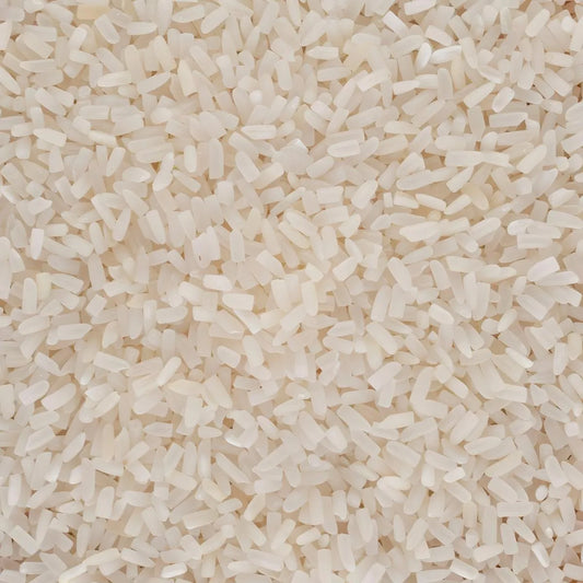 Gros plan sur les brisures de riz TERSOL cassé 2 fois, grains blancs parfaits pour une cuisson rapide et une texture moelleuse.