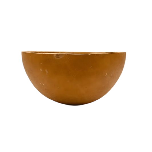 African calabash, medium size. A half light brown calabash on a black background.