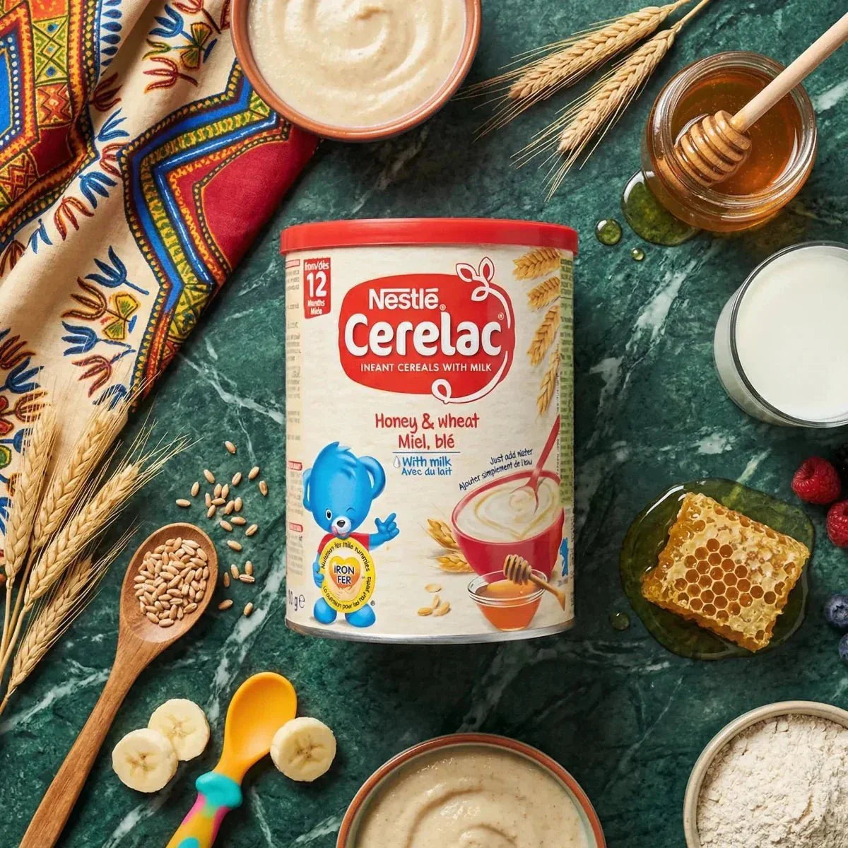 NESTLÉ Cerelac grano miele latte 400g. Scatola circondata da ingredienti: miele, latte, grano, banana, marmorizzato.