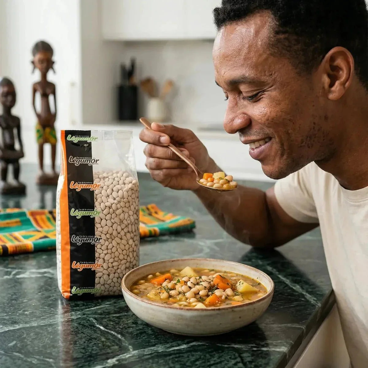LEGUMOR white beans 1kg. Man enjoying a white bean soup.