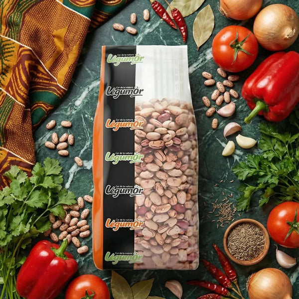 Légumor product: package of pink beans. Culinary staging with fresh vegetables, spices.
