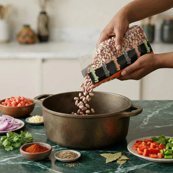 A person is pouring LEGUMOR pink Cocos beans into a pot.