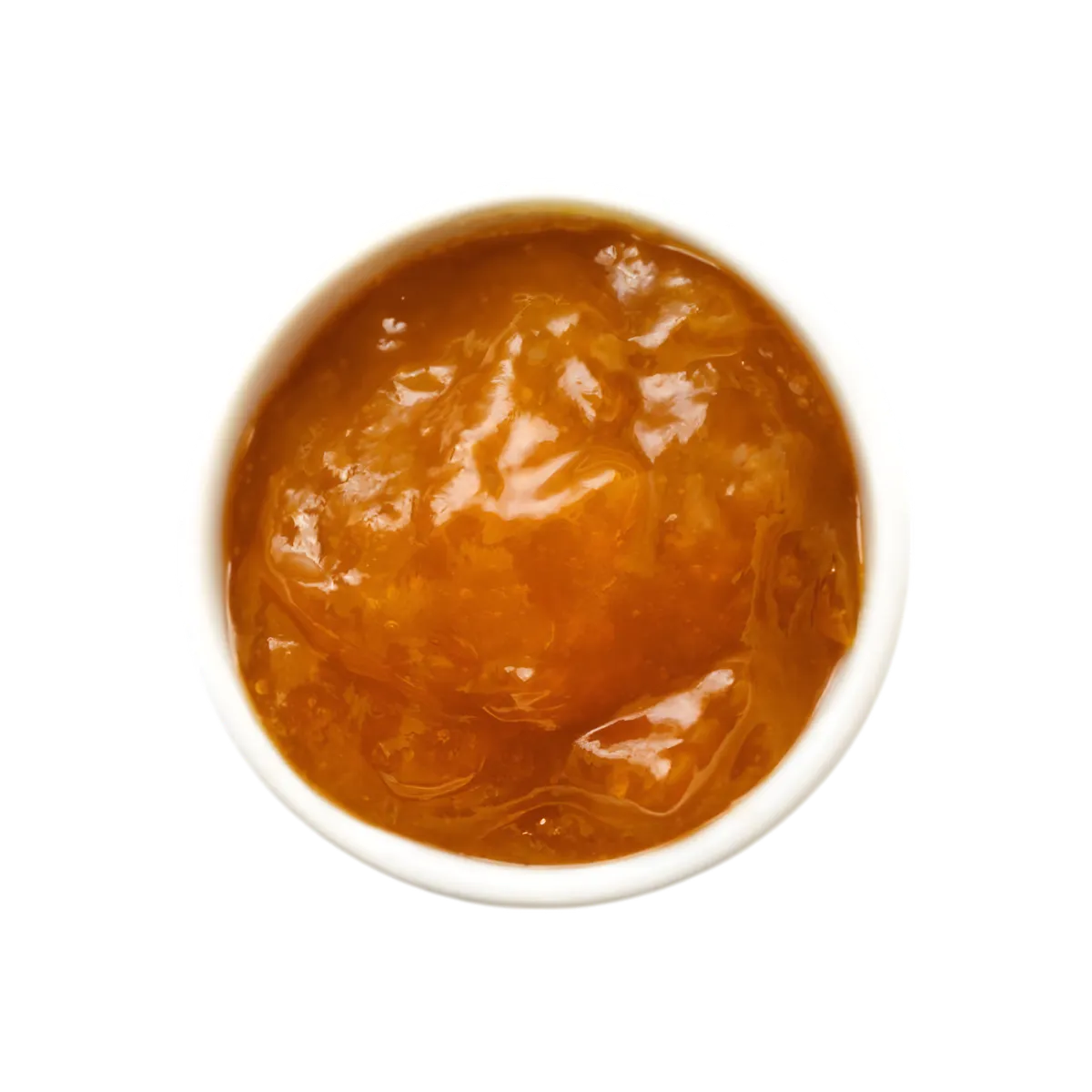 Vue de dessus d'une confiture baobab RACINES BIO onctueuse et dorée, texture gourmande parfaite pour petit-déjeuner ou goûter sain.