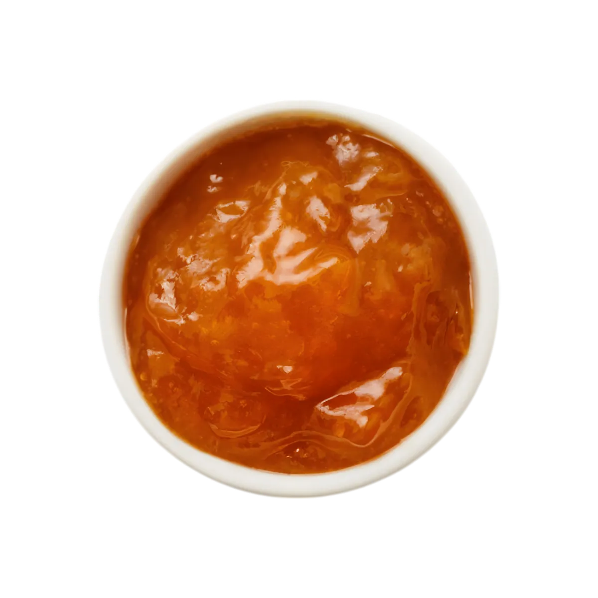 Vue rapprochée de la confiture d'abricot pays M'AMOUR, texture onctueuse et couleur dorée, parfaite pour tartines ou pâtisseries.