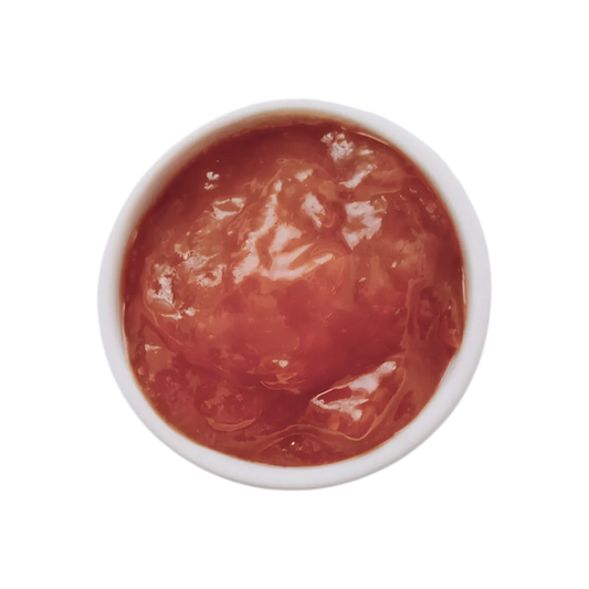 Vue de dessus d'une confiture de goyave RACINES BIO dans un bol blanc, texture onctueuse idéale pour tartines et pâtisseries bio.