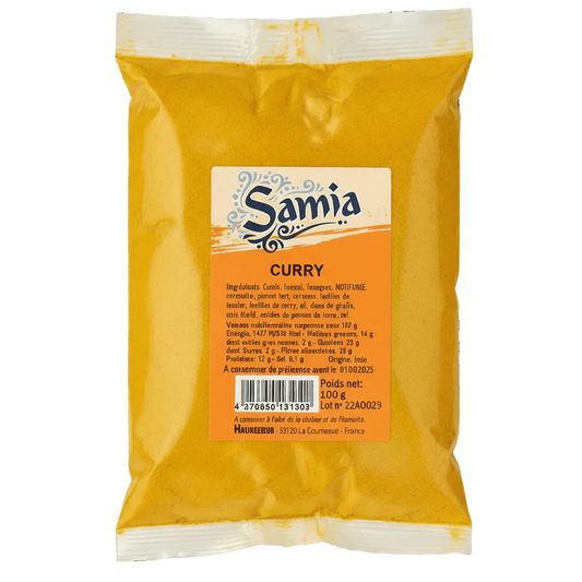 Bolsa de curry SAMIA, especias en polvo. Primer plano del envase naranja con los ingredientes.