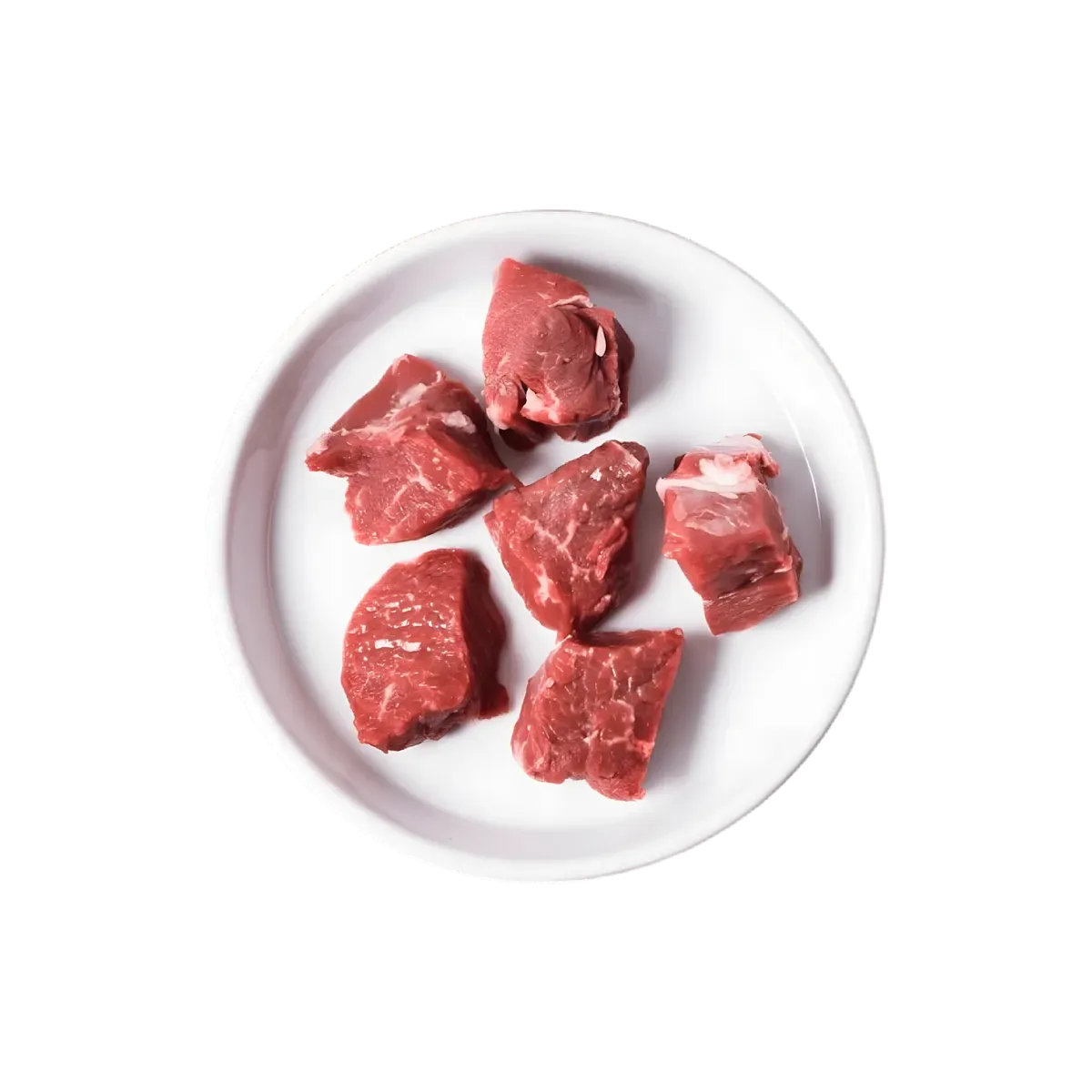 Tranches épaisses d’émincé de bœuf surgelé présentées dans une assiette blanche, viande fraîche pour préparation rapide.