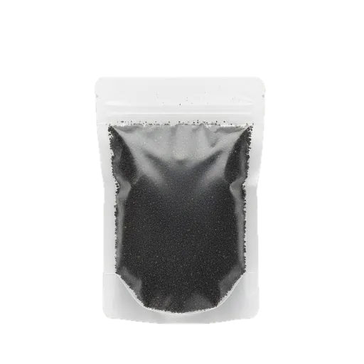 Sachet de graines fermentées de Soumbara / Nététou en grain, épice salée traditionnelle d'Afrique de l’Ouest pour assaisonnement riche.