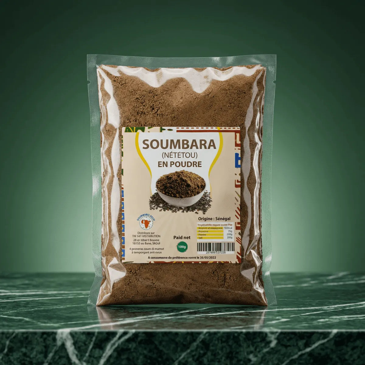 Soumbara Spice / Powdered Nététou NUMBER ONE, in a transparent pouch on a dark green background.