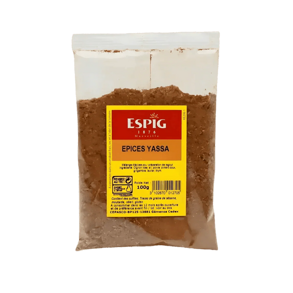 Bolsa de especias Yassa ESPIG, 100g. Primer plano de la bolsa de especias sobre fondo verde.
