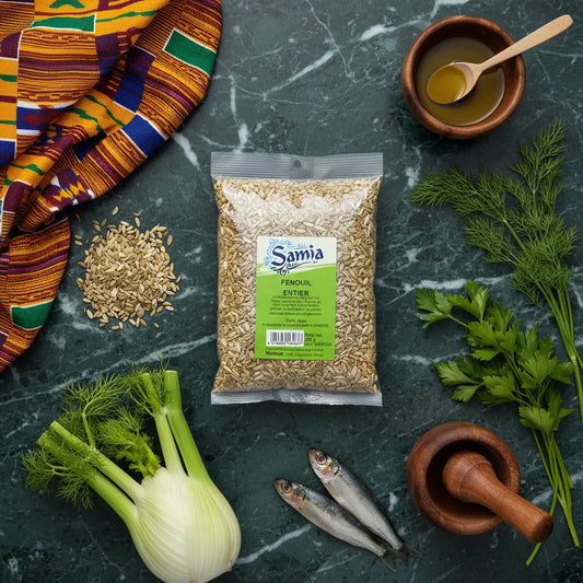 Fenouil entier SAMIA présenté avec ingrédients frais comme fenouil, sardines et herbes. Épice anisée pour cuisine méditerranéenne.