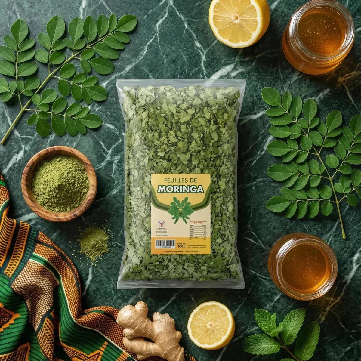 Moringablad NUMBER ONE 100g. Zakje met gedroogde bladeren, poeder, citroen, honing.
