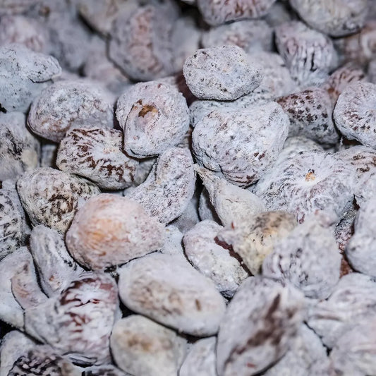 Gros plan sur figues sèches Calabacita VILLACRUZ, fruits moelleux et sucrés recouverts de sucre naturel, idéals pour cuisine saine.