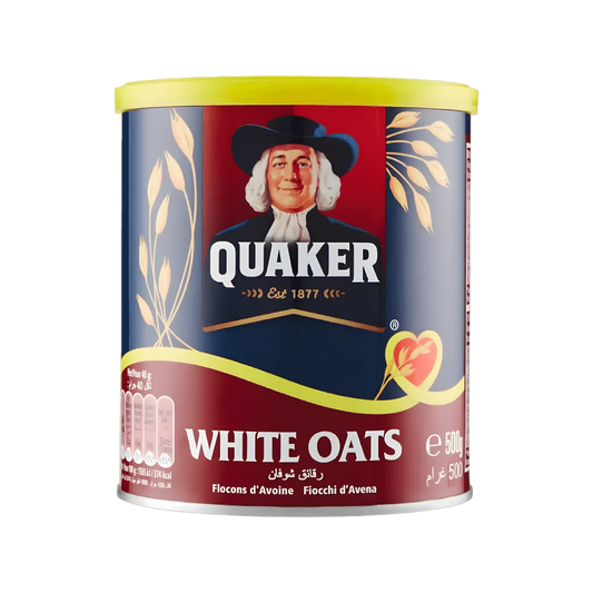 Boîte de flocons d'avoine QUAKER 500g, idéale pour un petit-déjeuner équilibré. Emballage coloré avec logo emblématique et informations nutritionnelles.