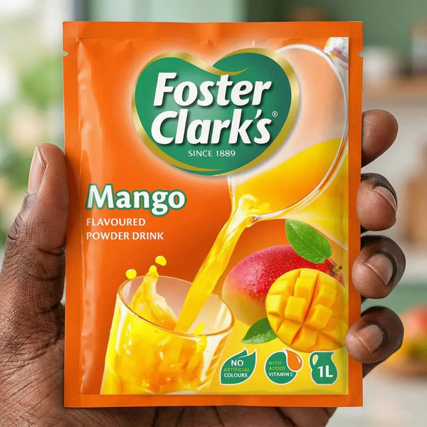 Boisson en poudre aromatisée à la mangue de Foster Clark's, montrant un verre rempli.