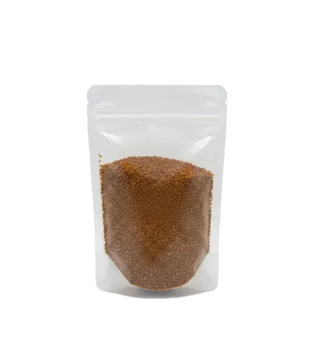 Sachet de gnangnan moulu sans étiquette visible, épice traditionnelle idéale pour rehausser les plats africains et sauces maison.