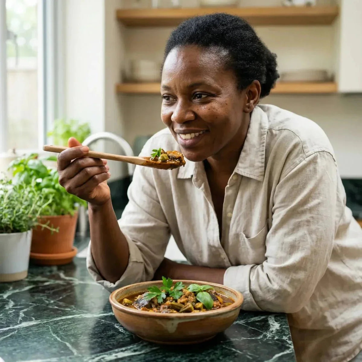 Smiling woman enjoying a dish with a wooden spoon. Bowl of food garnished with parsley.