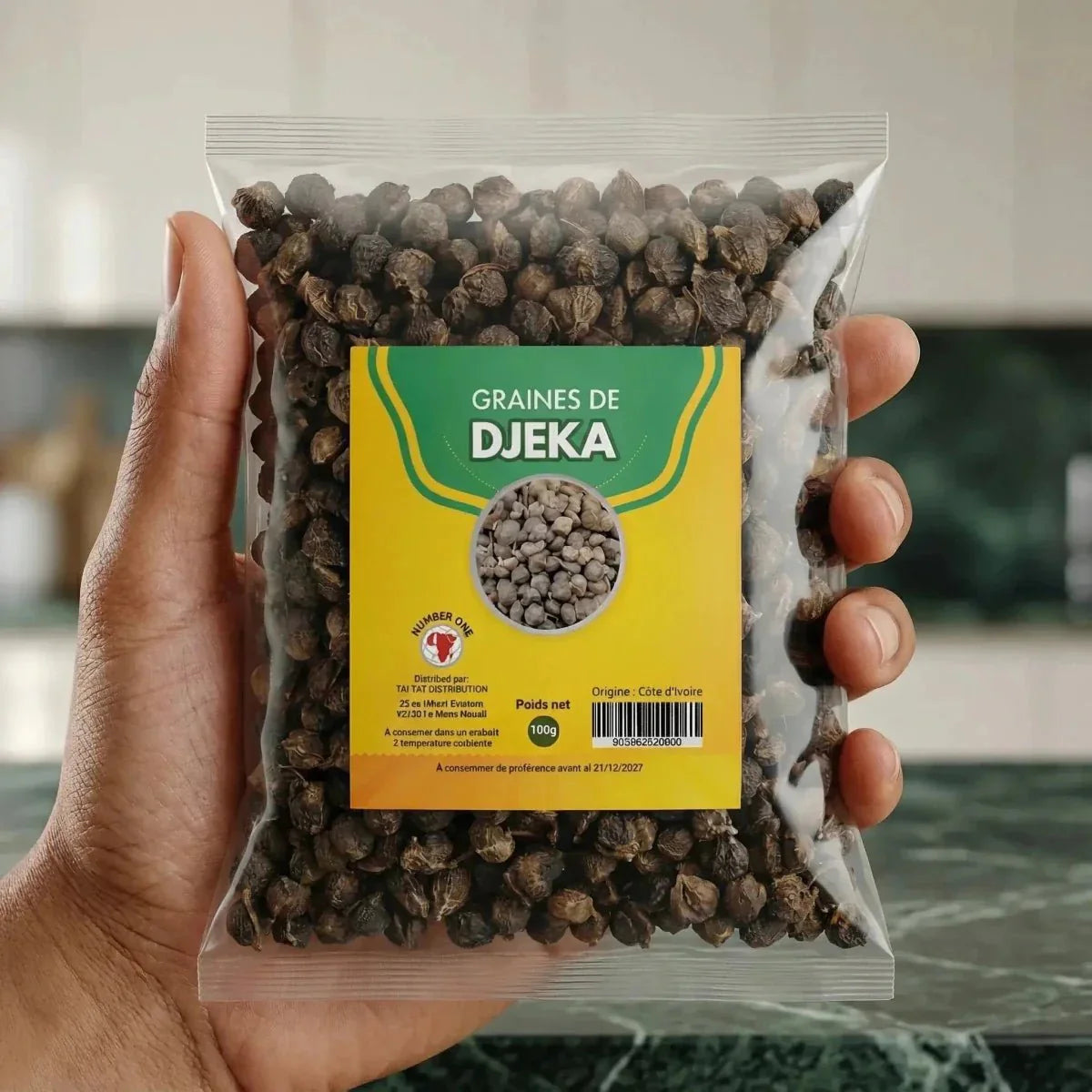 Djeka seeds by NUMBER ONE, displayed in a transparent bag held in hand.