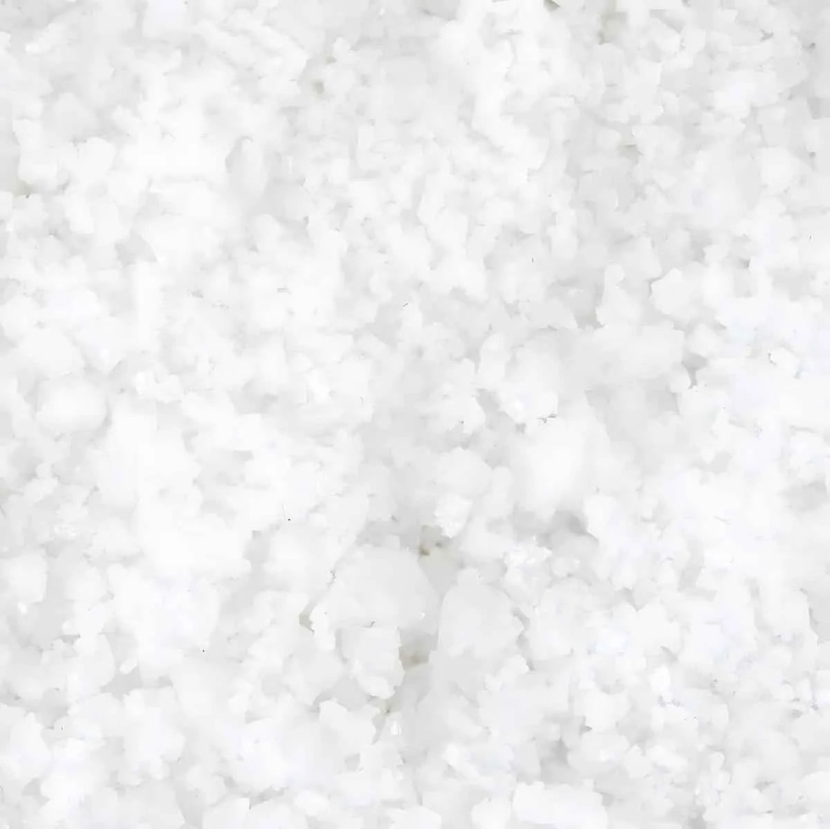 Texture granuleuse du Gros Sel CEREBOS, sel de mer naturel parfait pour assaisonnement, cuisson et conservation des aliments.