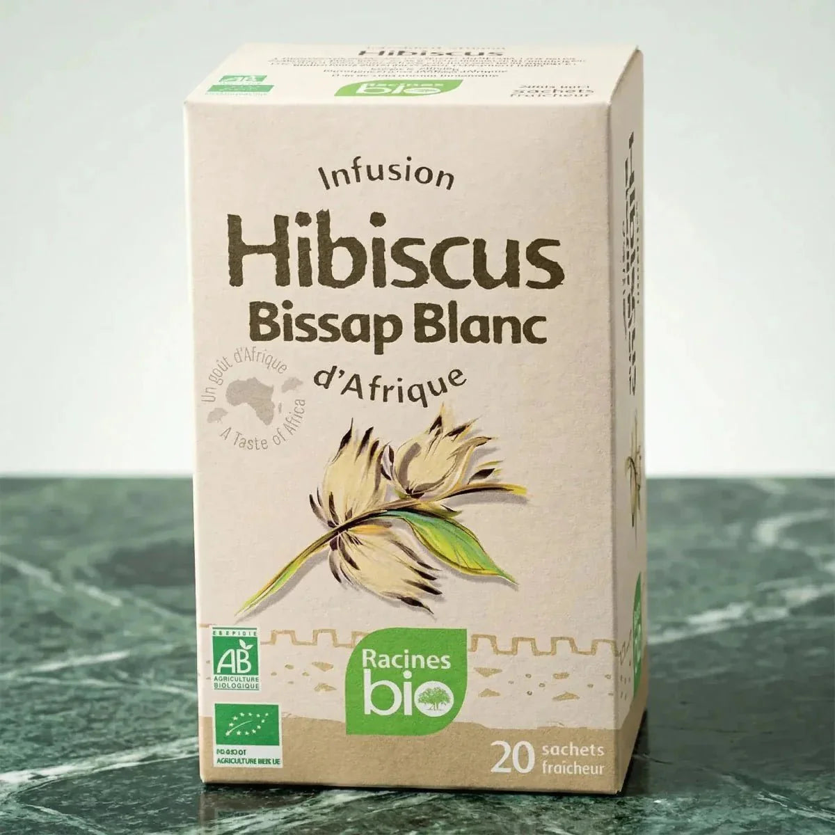 Infusion d'Afrique hibiscus blanc bio de Racines, avec une illustration de fleur blanche.