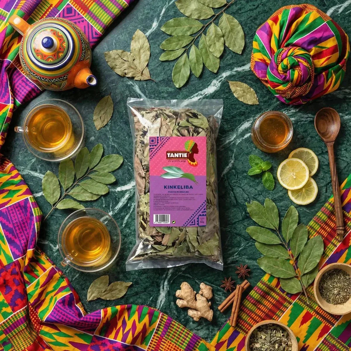 Kinkeliba Tantie, 50g. Colorful teapot, 2 cups of tea, honey, lemon, ginger, cinnamon.